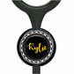 A black and silver stethoscope with a personalized name badge attached to it.