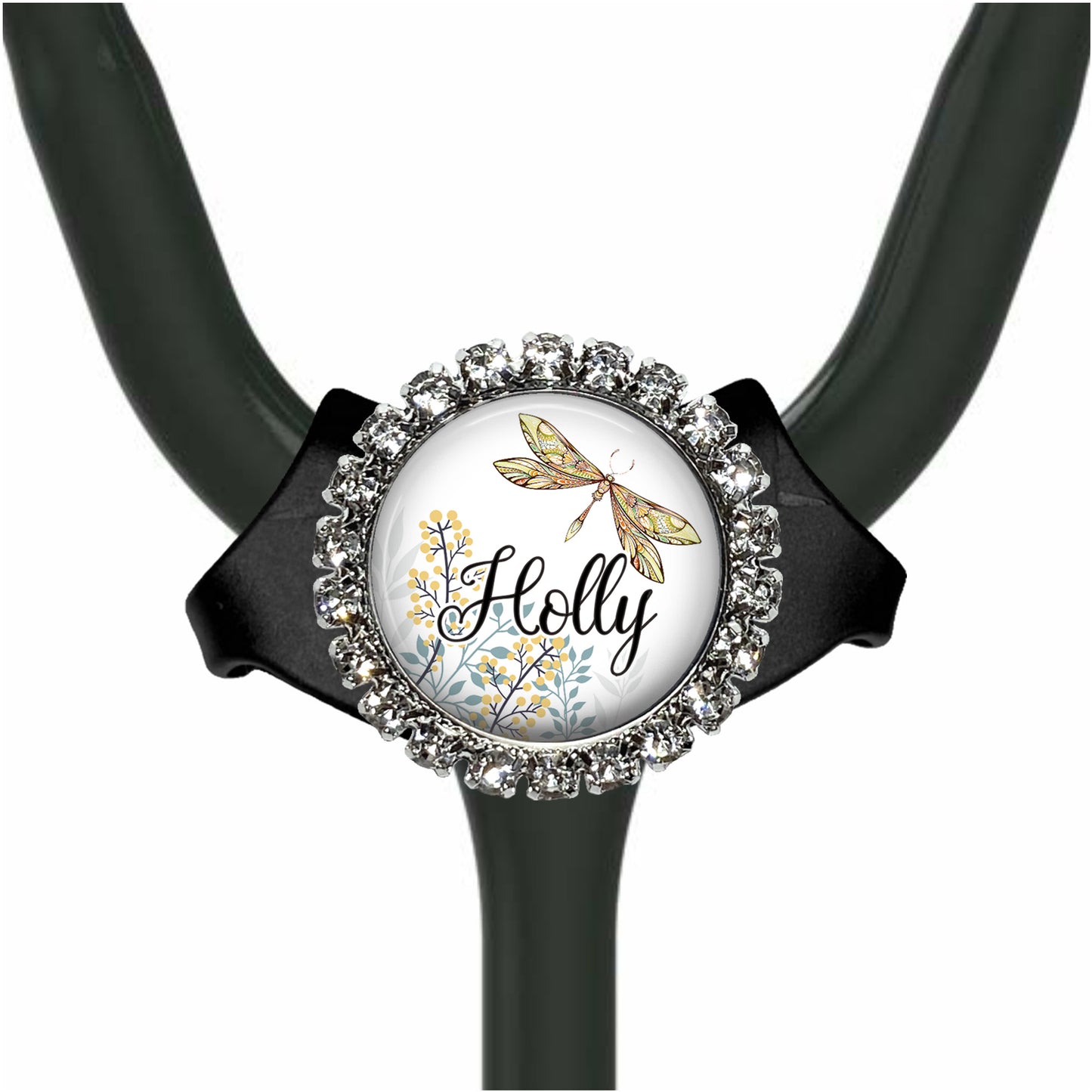 A black stethoscope with a round, ornate charm featuring a dragonfly and the word "Holly" on it.