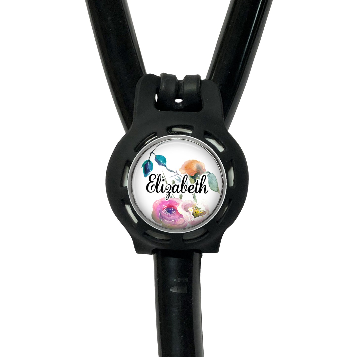 A black stethoscope with a personalized name badge attached to it.