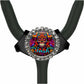 A black stethoscope with a colorful, circular charm featuring a skull design and the word "Irish" written on it.