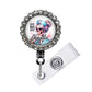 A lanyard with a decorative metal frame and a printed image of a skeleton wearing a nurse's outfit.