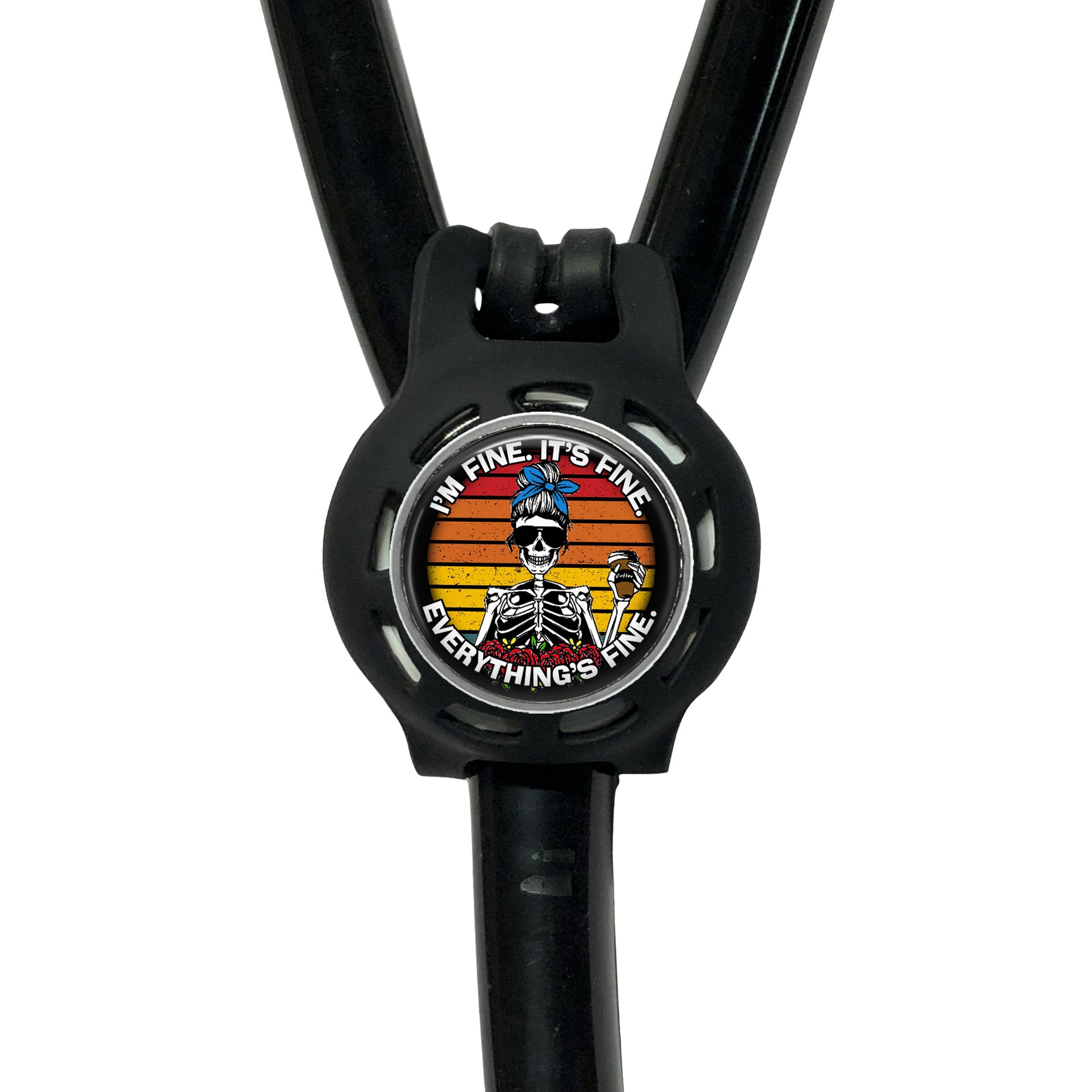 A black stethoscope with a circular badge featuring a skeleton wearing sunglasses and the text "I'm fine, it's fine, everything's fine"