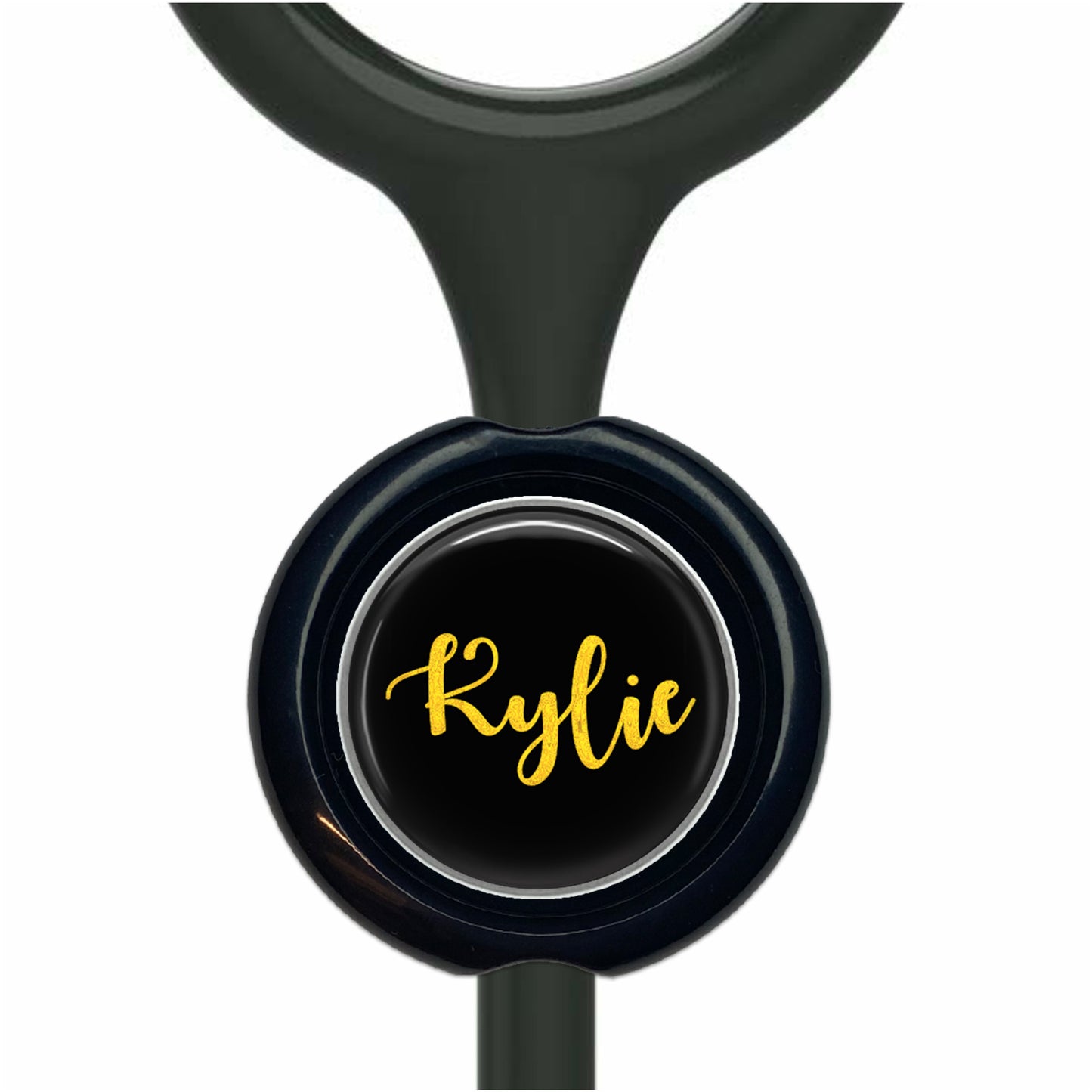 A black and yellow nameplate with the name " Kylie" printed on it.