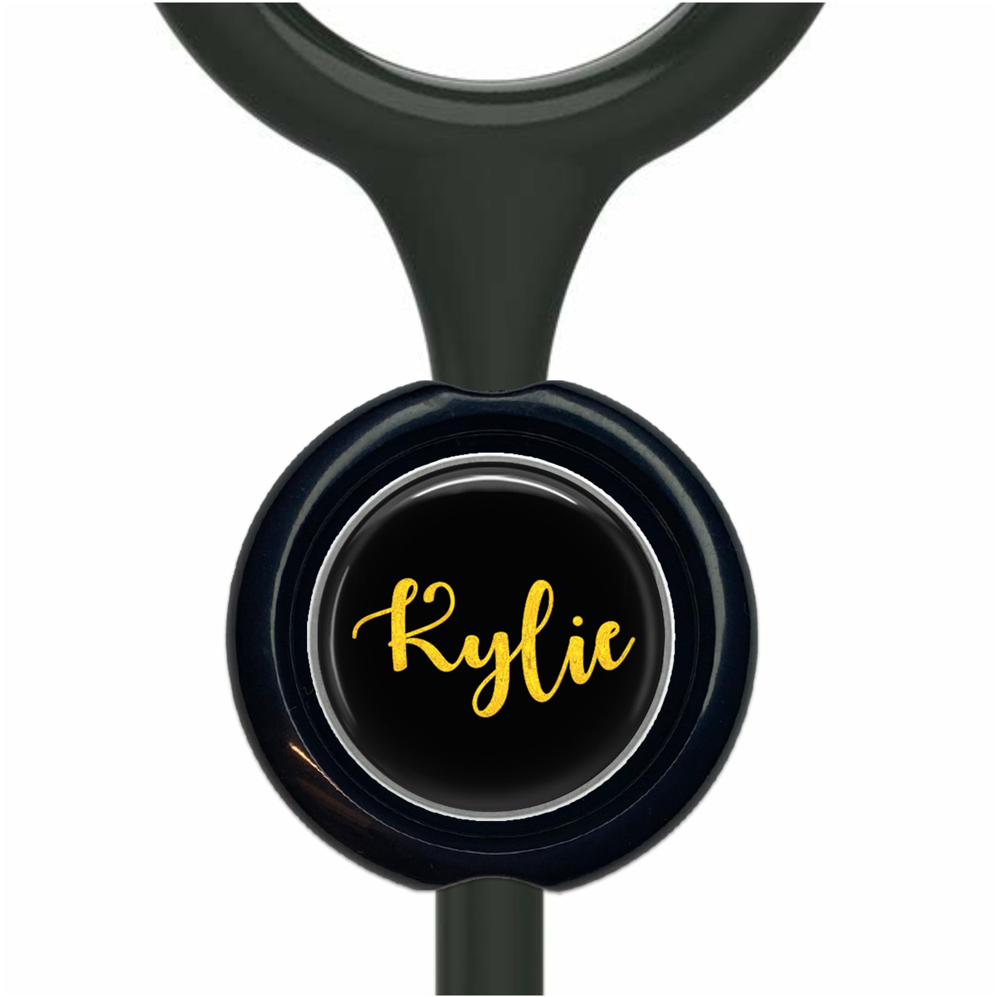 A black and yellow nameplate with the name " Kylie" printed on it.