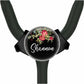 A black stethoscope with a floral design and the name "Shannon" printed on it.
