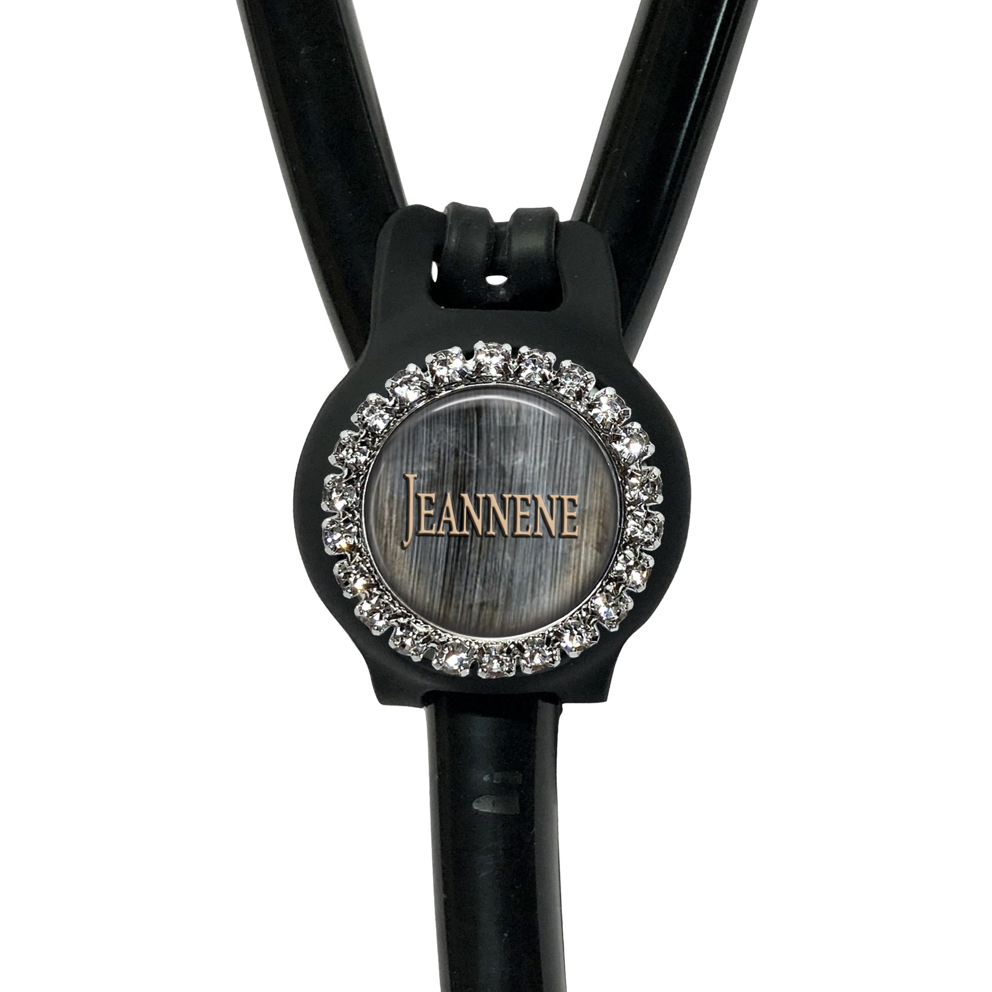 A black stethoscope with a round, embossed logo on the front.