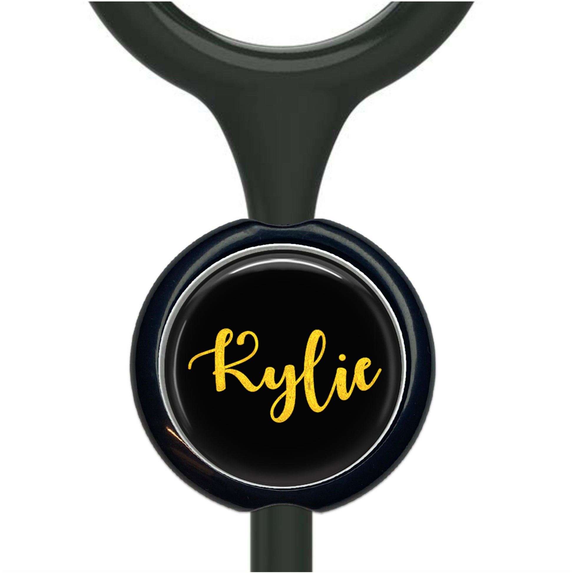 A black and yellow nameplate with the name " Kylie" printed on it.