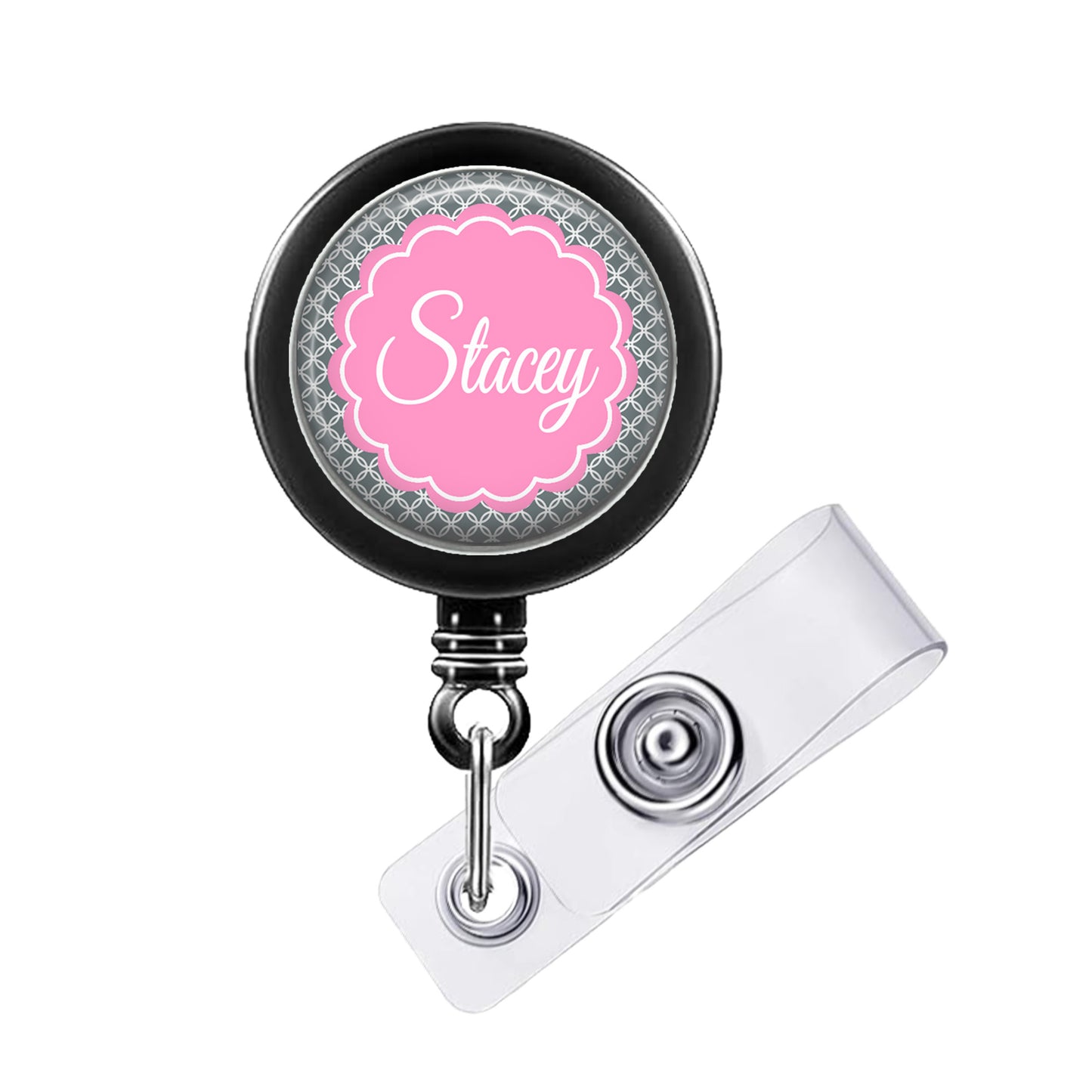 A black badge holder with a pink circular badge that says "Stacey".