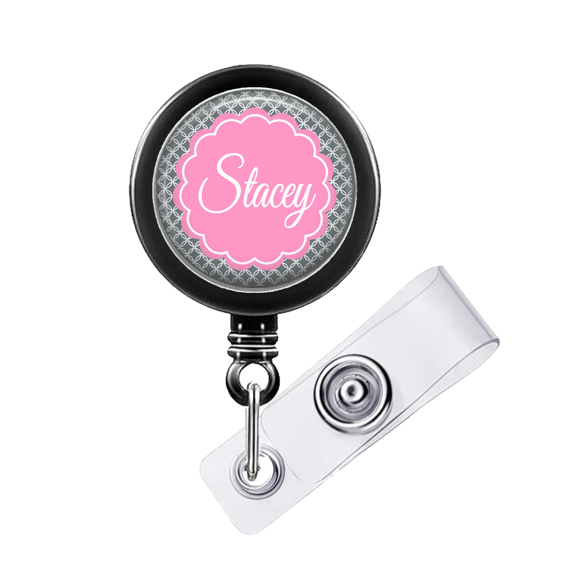 A black badge holder with a pink circular badge that says "Stacey".
