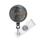 A round badge holder with the name "Jeanne" printed on it.