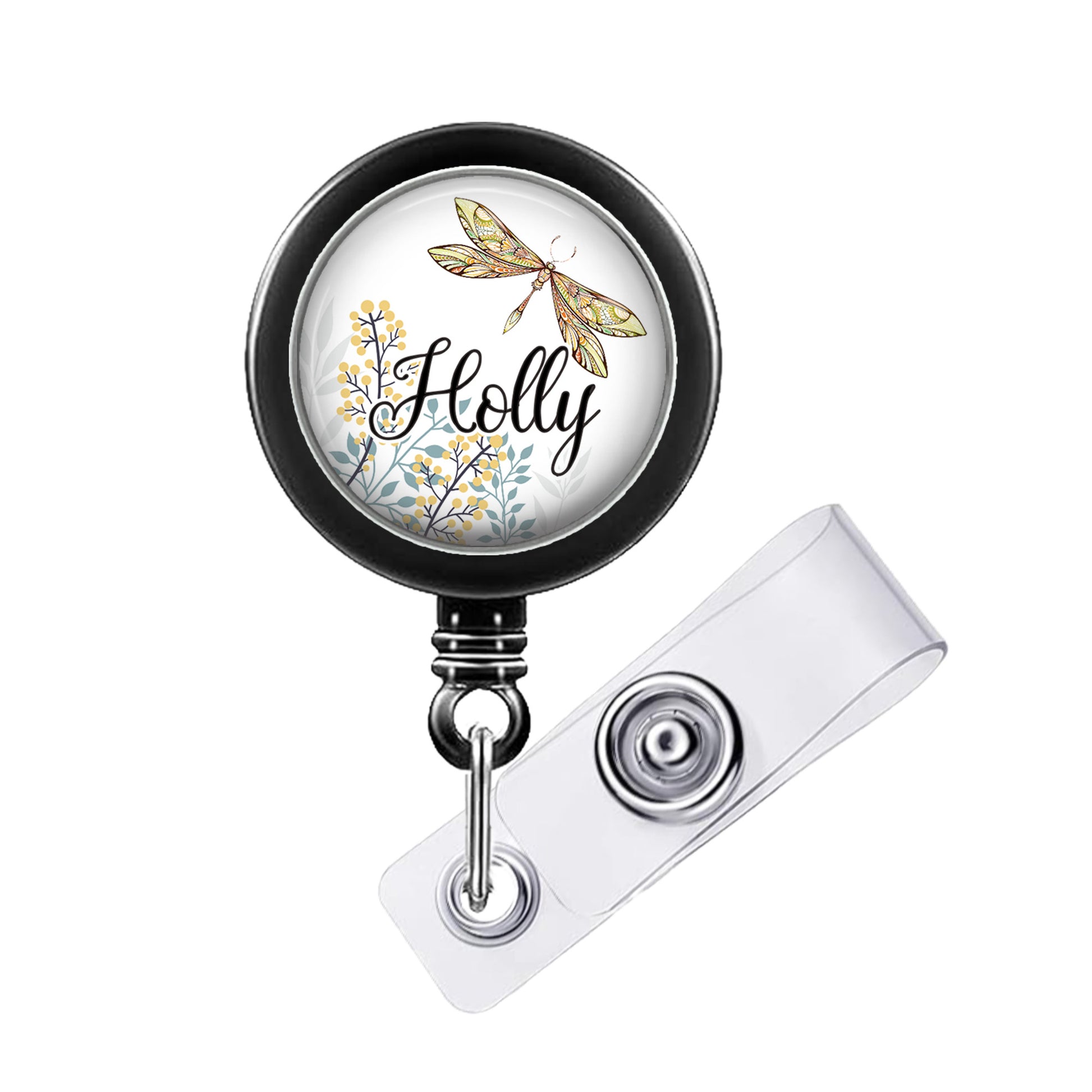 A black and white lanyard with a circular badge on it. The badge features a dragonfly and the word "Holly" written on it.