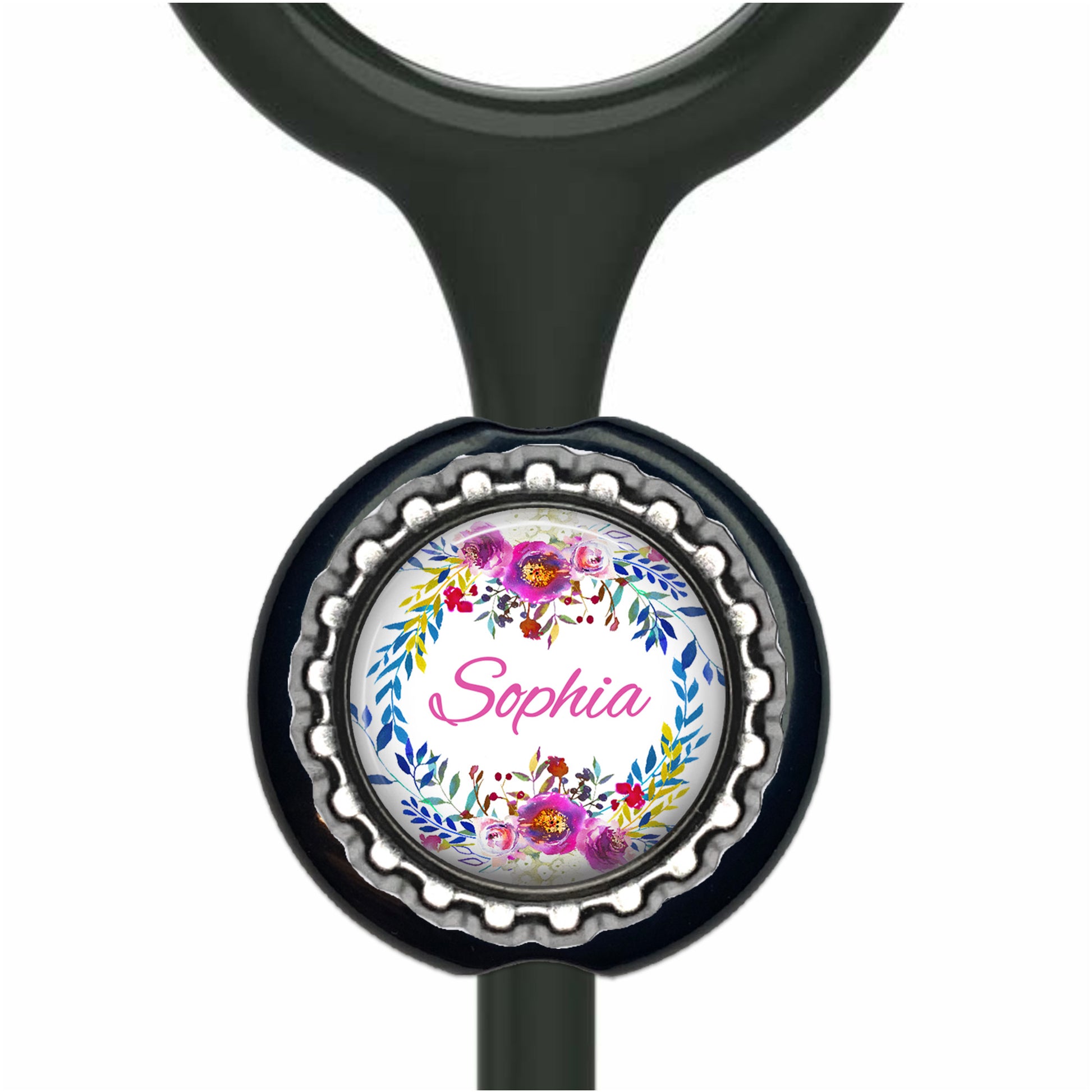 A black stethoscope with a round, floral-designed charm attached to it, displaying the name "Sophia".