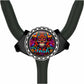 A colorful, circular design featuring a skull with a floral pattern and the word "Irish" written on it, mounted on a black strap or bracelet.