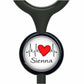 A black stethoscope with a round badge featuring a red heart and a line graph, along with the name "Siena" written below.