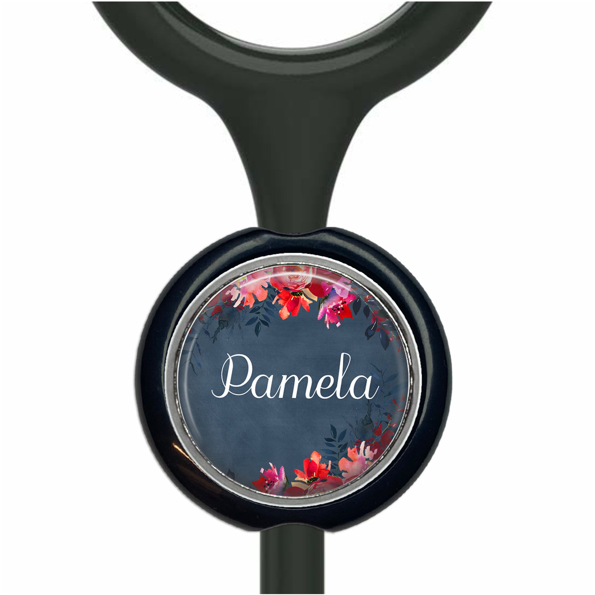 A black stethoscope with a circular badge featuring a floral design and the name "Pamela" written on it.