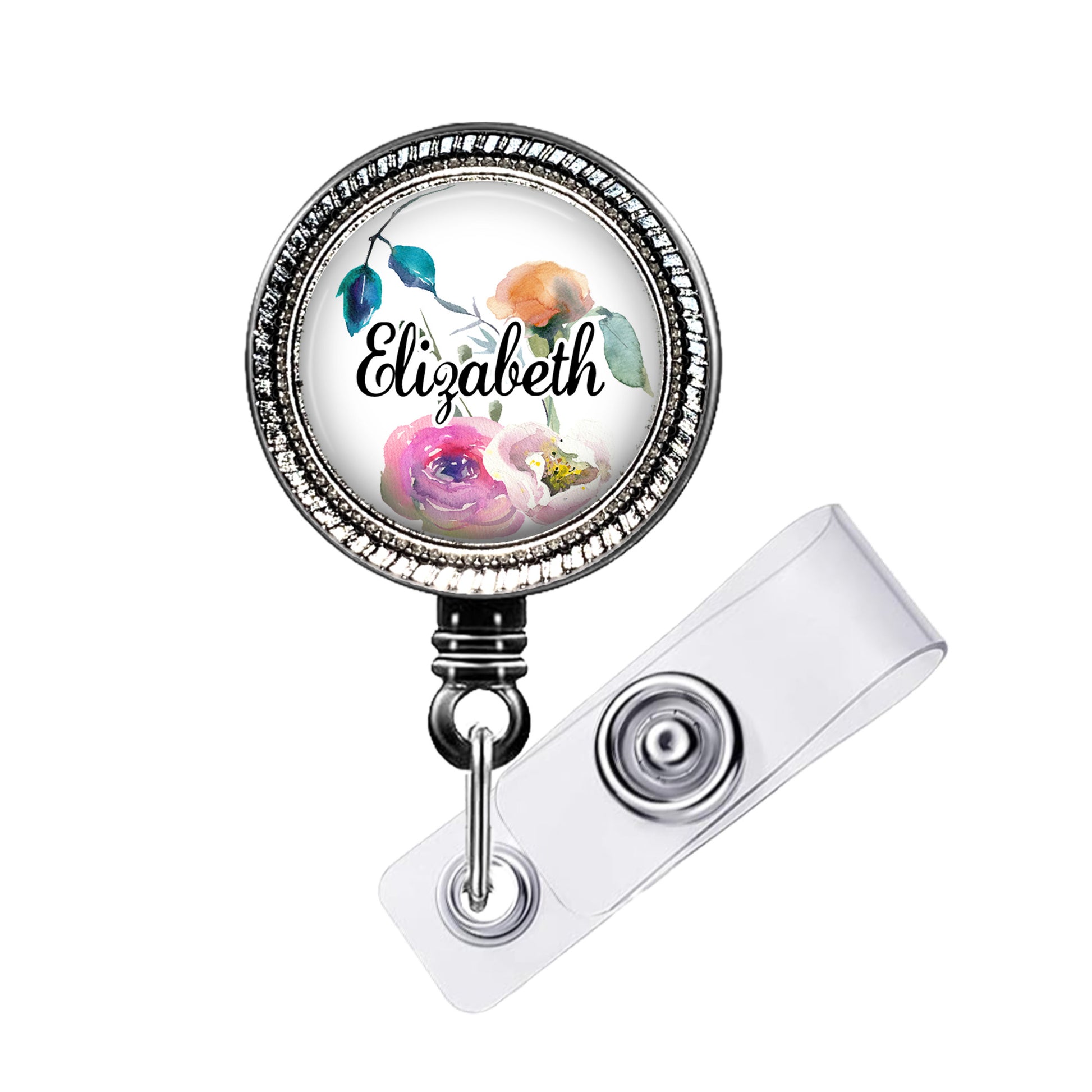A round badge holder with a floral design and the name "Eliza" printed on it.