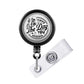 A black and white badge holder with a printed message on it.