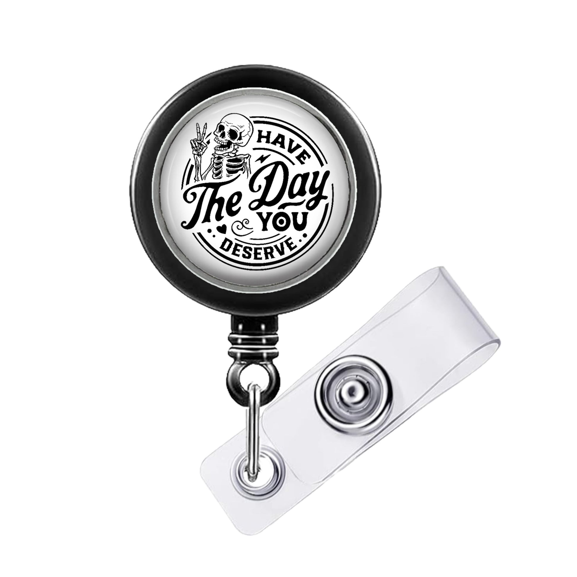 A black and white badge holder with a printed message on it.
