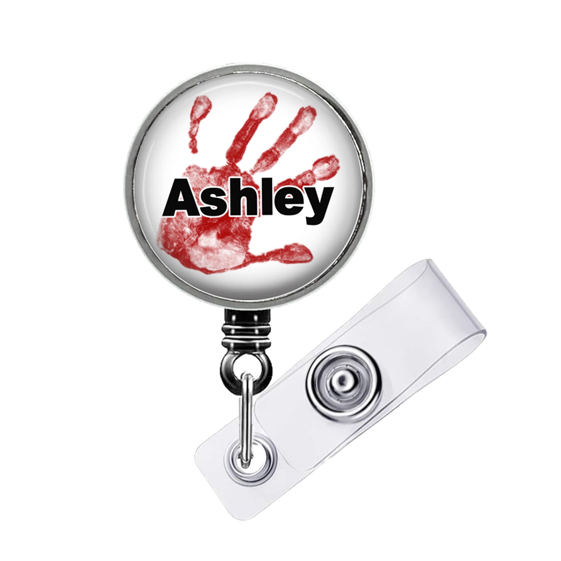 A badge holder with a handprint design and the name "Ashley" printed on it.