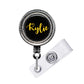 A black and gold badge holder with the name " Kylie" printed on it.