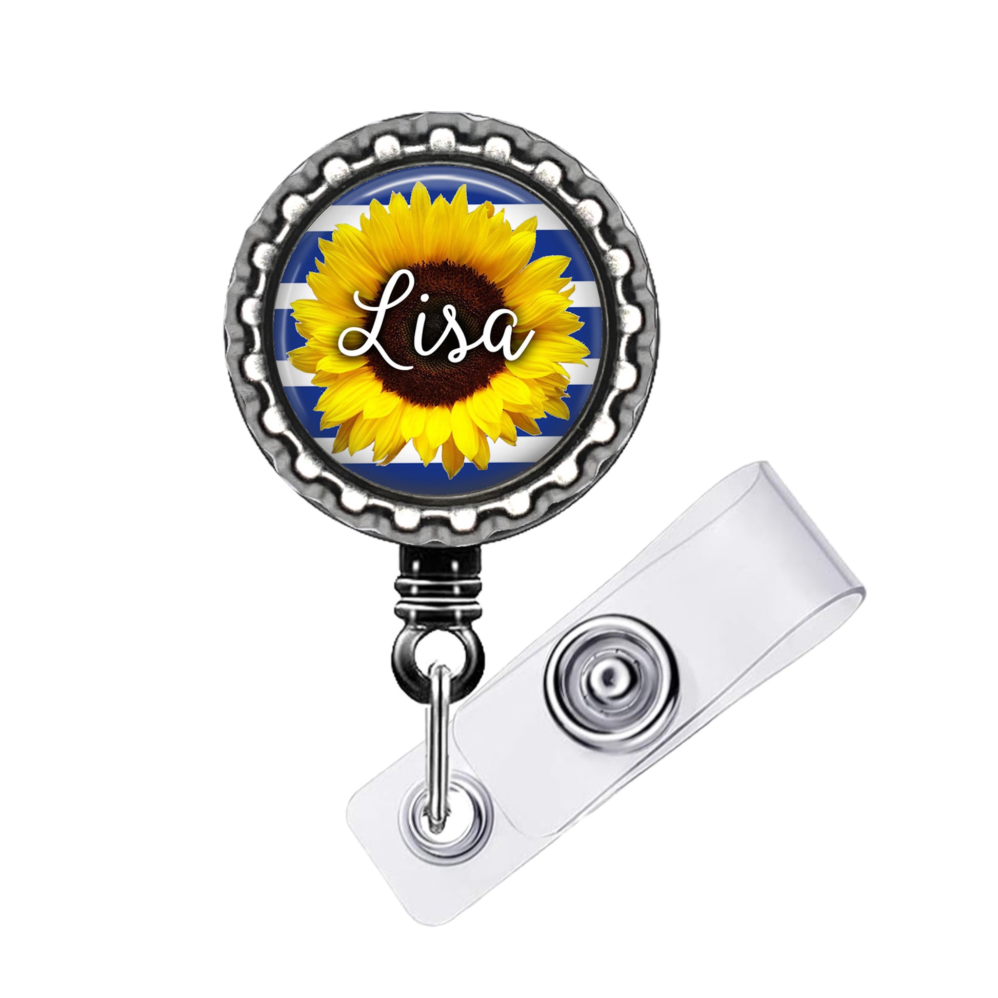 A round badge holder with a sunflower design and the name "Lisa" written on it.