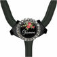 A black stethoscope with a personalized name badge on it.