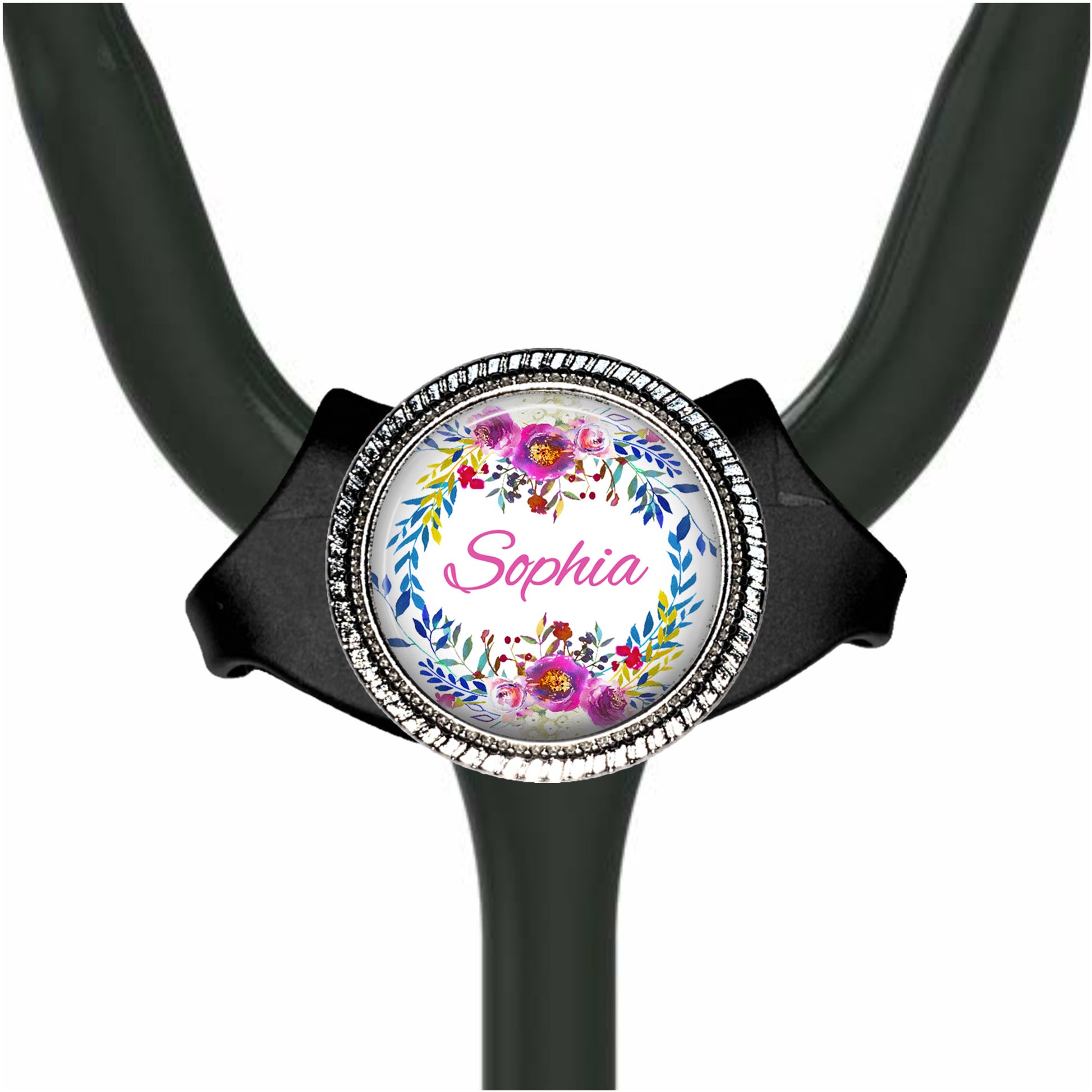 A black stethoscope with a personalized name badge on it.