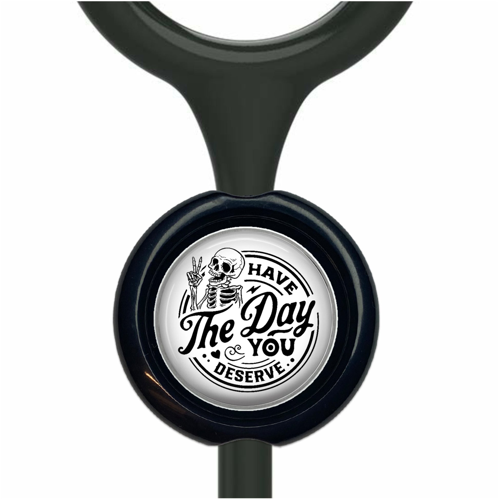 A black and white sticker with a skeleton and the text "The Day You Serve" printed on it.