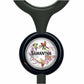 A black stethoscope with a round, black and white floral design featuring a bird and flowers.