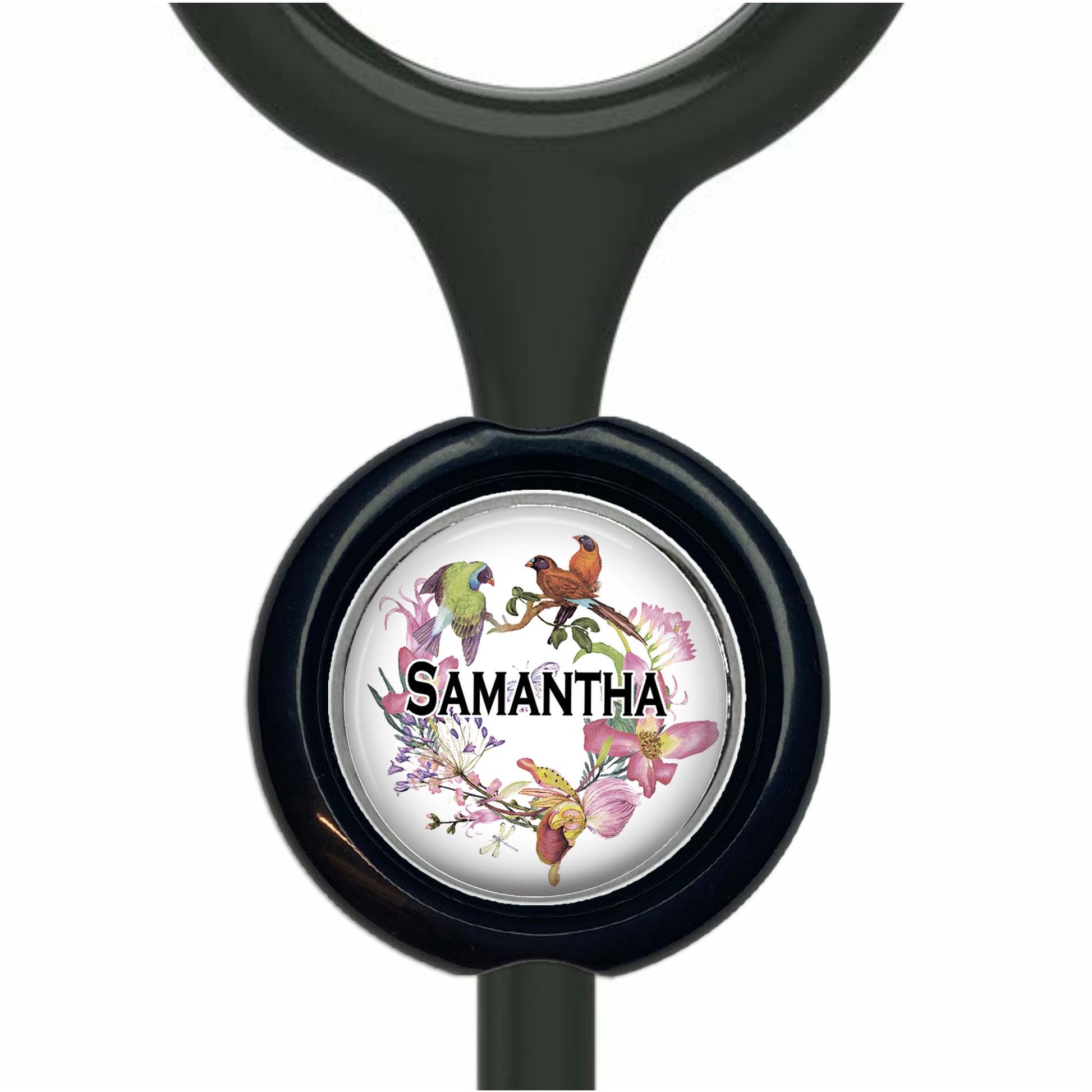 A black stethoscope with a round, black and white floral design featuring a bird and flowers.