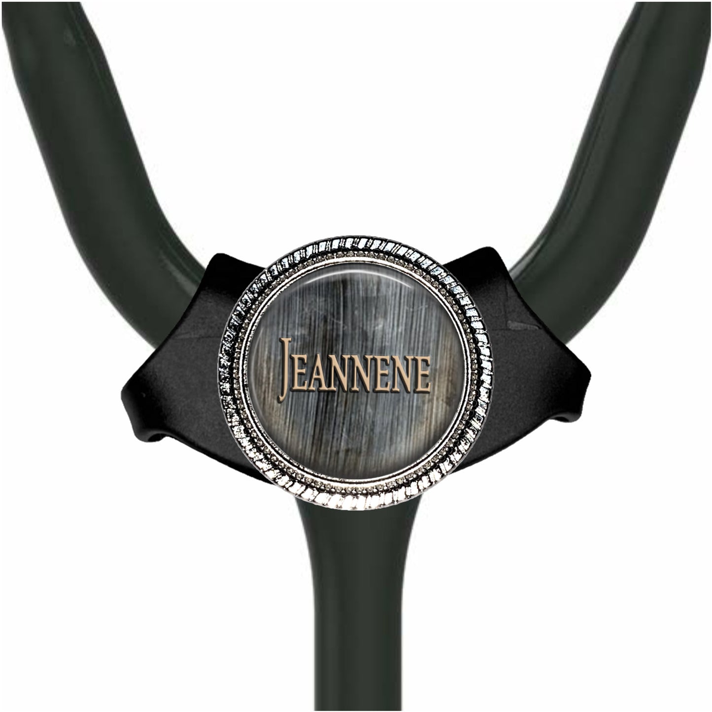 A black stethoscope with a silver circular badge on the handle.