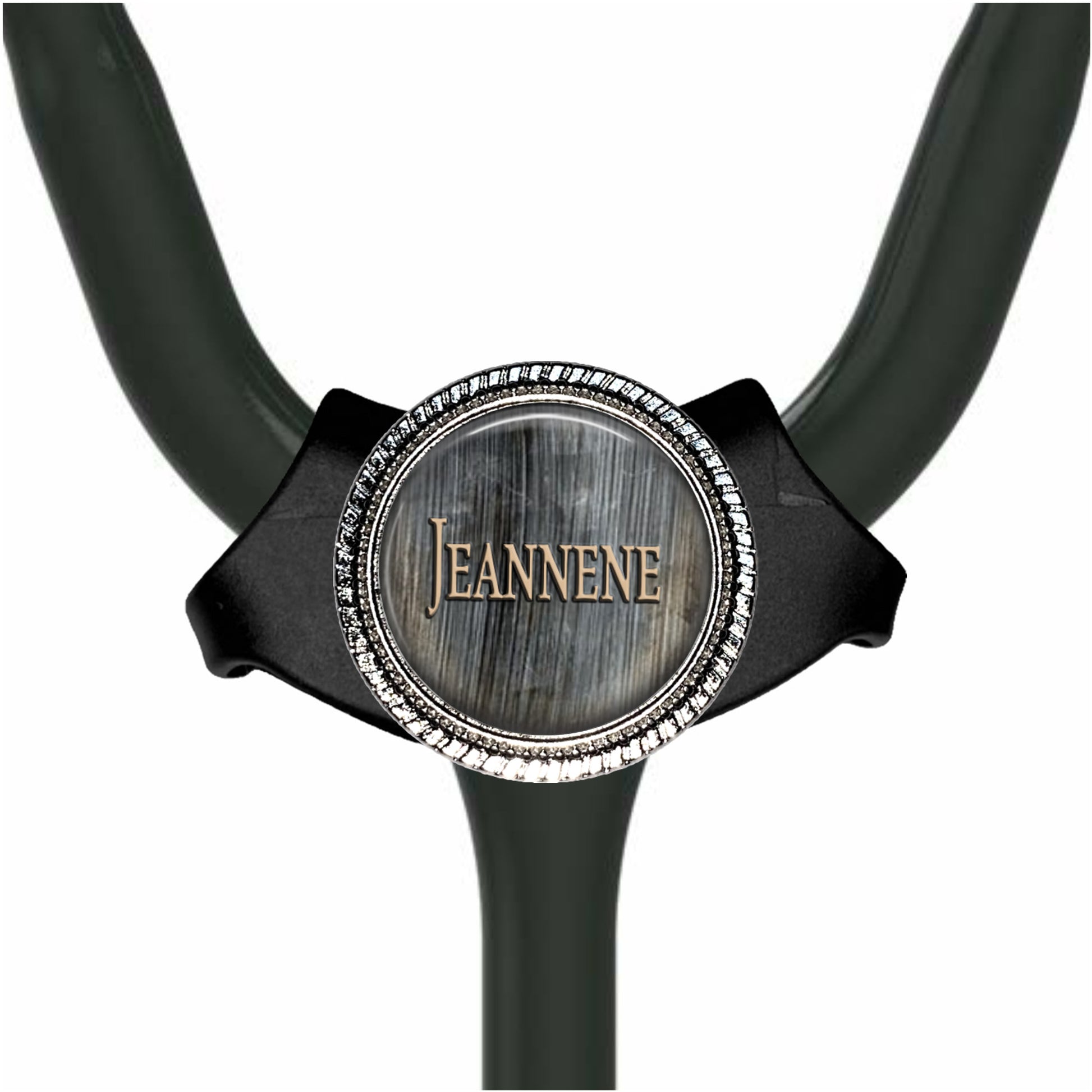 A black stethoscope with a silver circular badge on the handle.