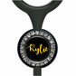 A black and silver personalized name badge with a rhinestone-encrusted circular design.