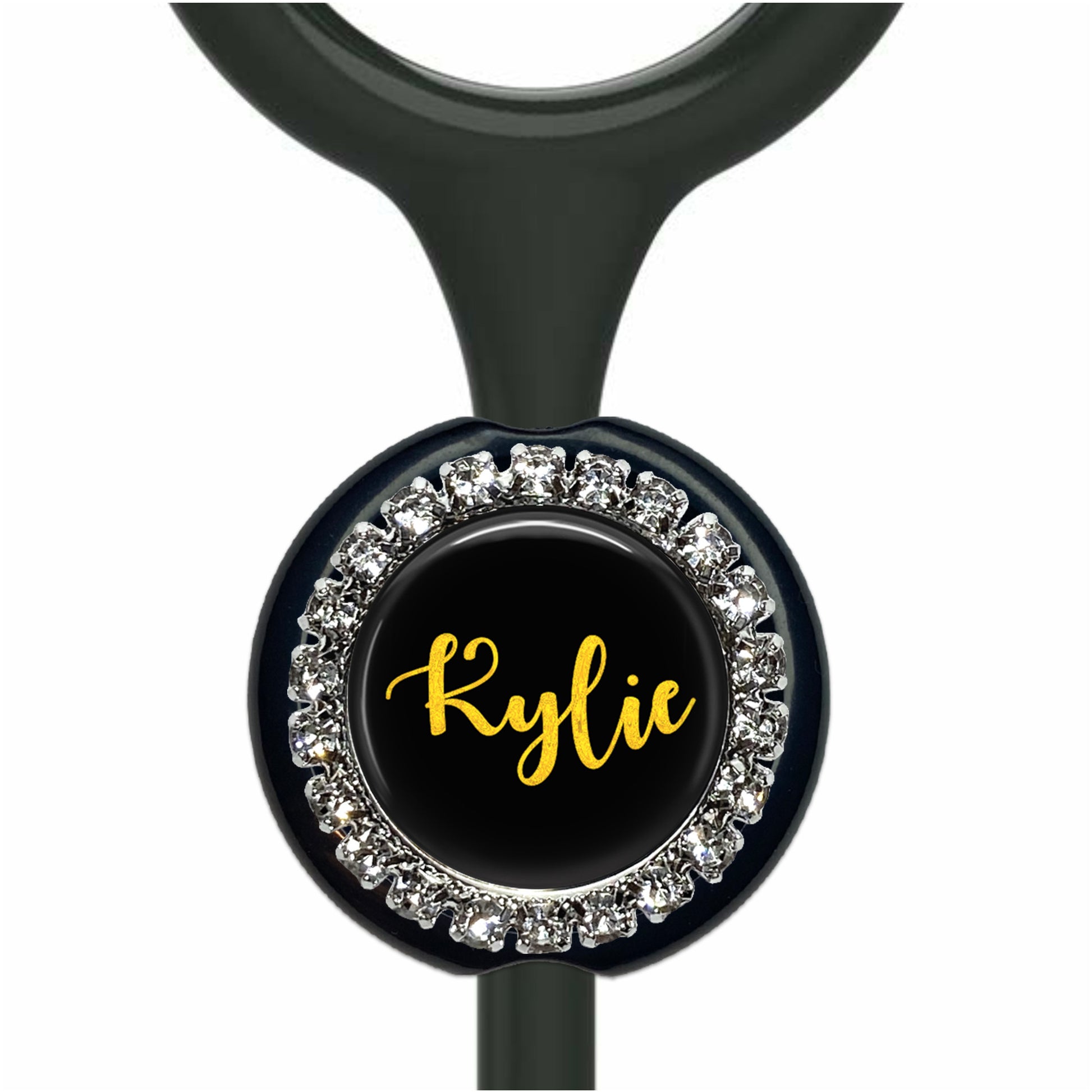 A black and silver personalized name badge with a rhinestone-encrusted circular design.