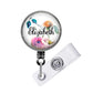 A round badge holder with a floral design and the name "Eliza" printed on it.