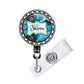 A round badge holder with a name tag attached to it.