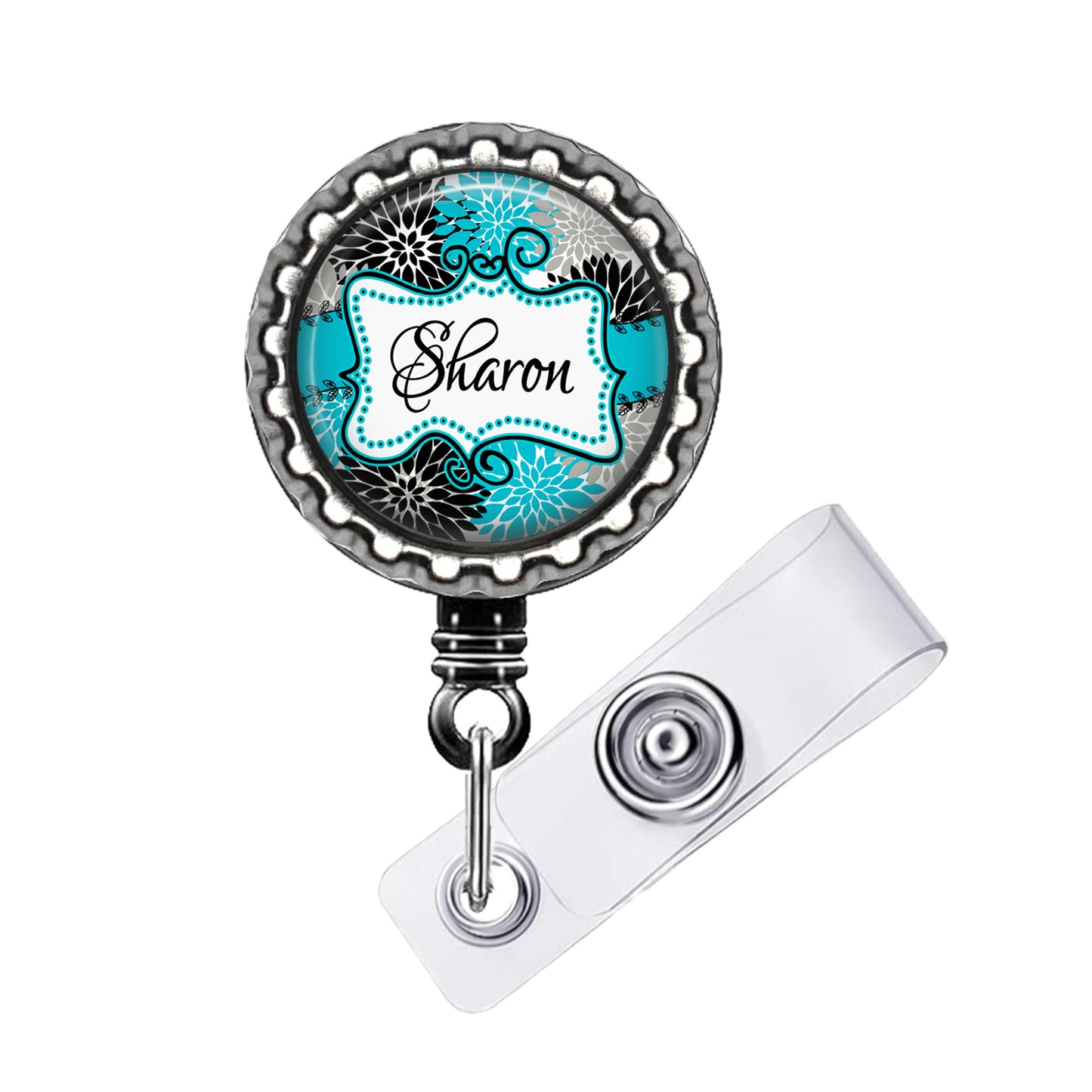 A round badge holder with a name tag attached to it.