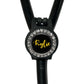 A black stethoscope with a personalized name badge attached to it.