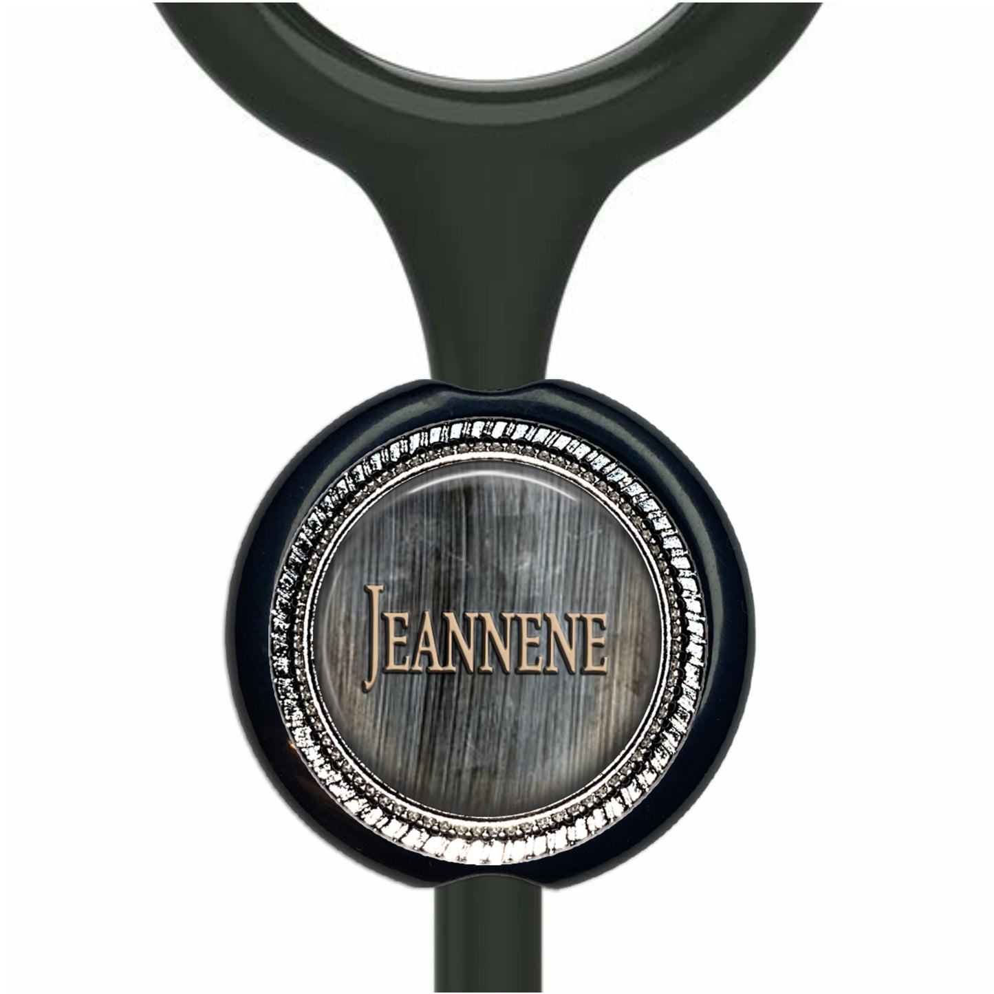 A black and silver stethoscope with a personalized nameplate attached to it.