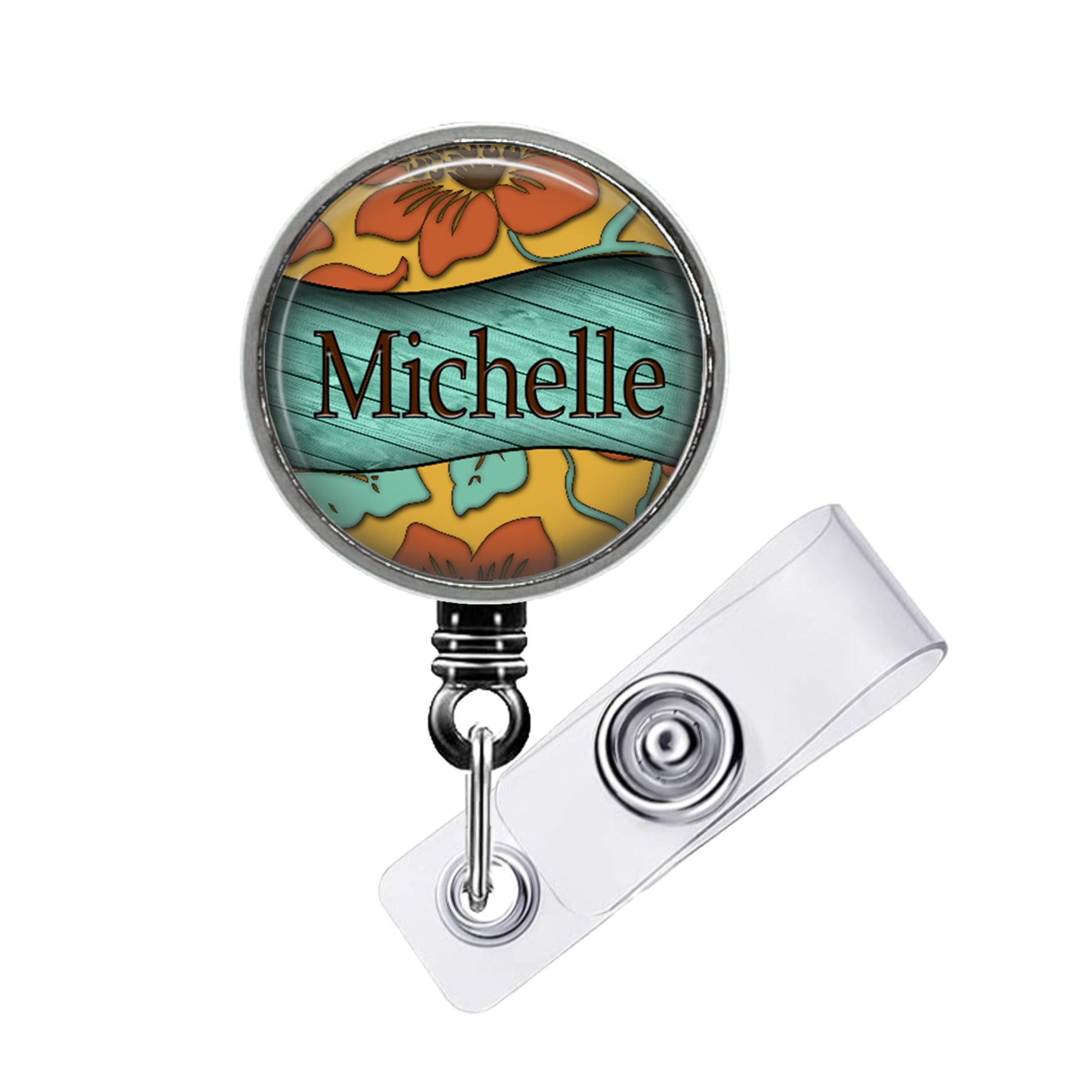 A round badge holder with a floral design and the name "Michelle" printed on it.