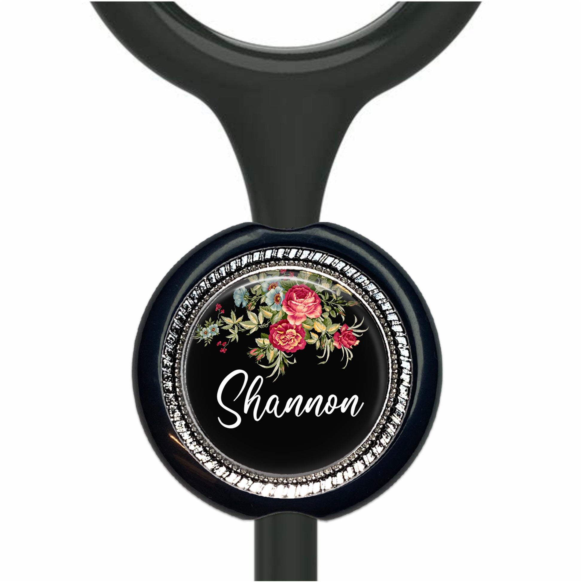 A black stethoscope with a floral design and the name "Shannon" written on it.
