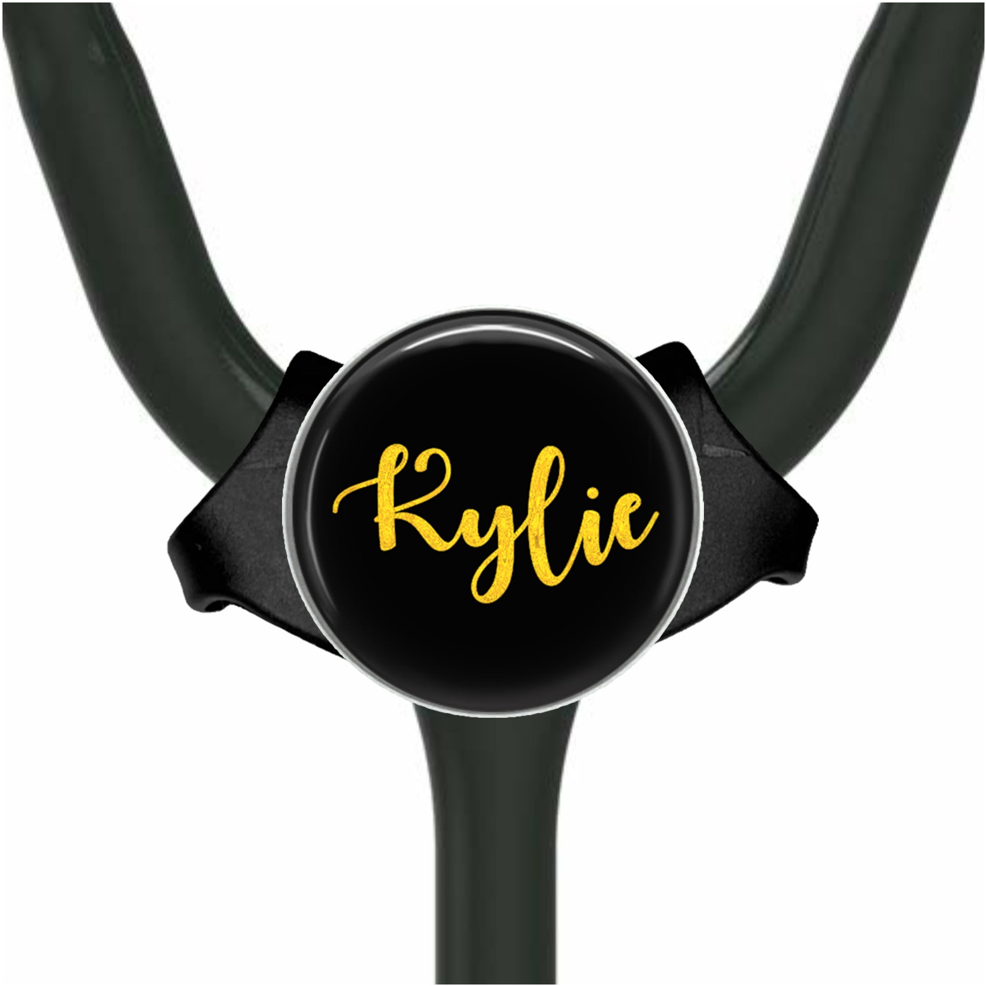 A black stethoscope with a personalized name badge attached to it.