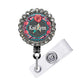 A colorful badge or lanyard with a floral design and the name "Kai Lynn" printed on it.