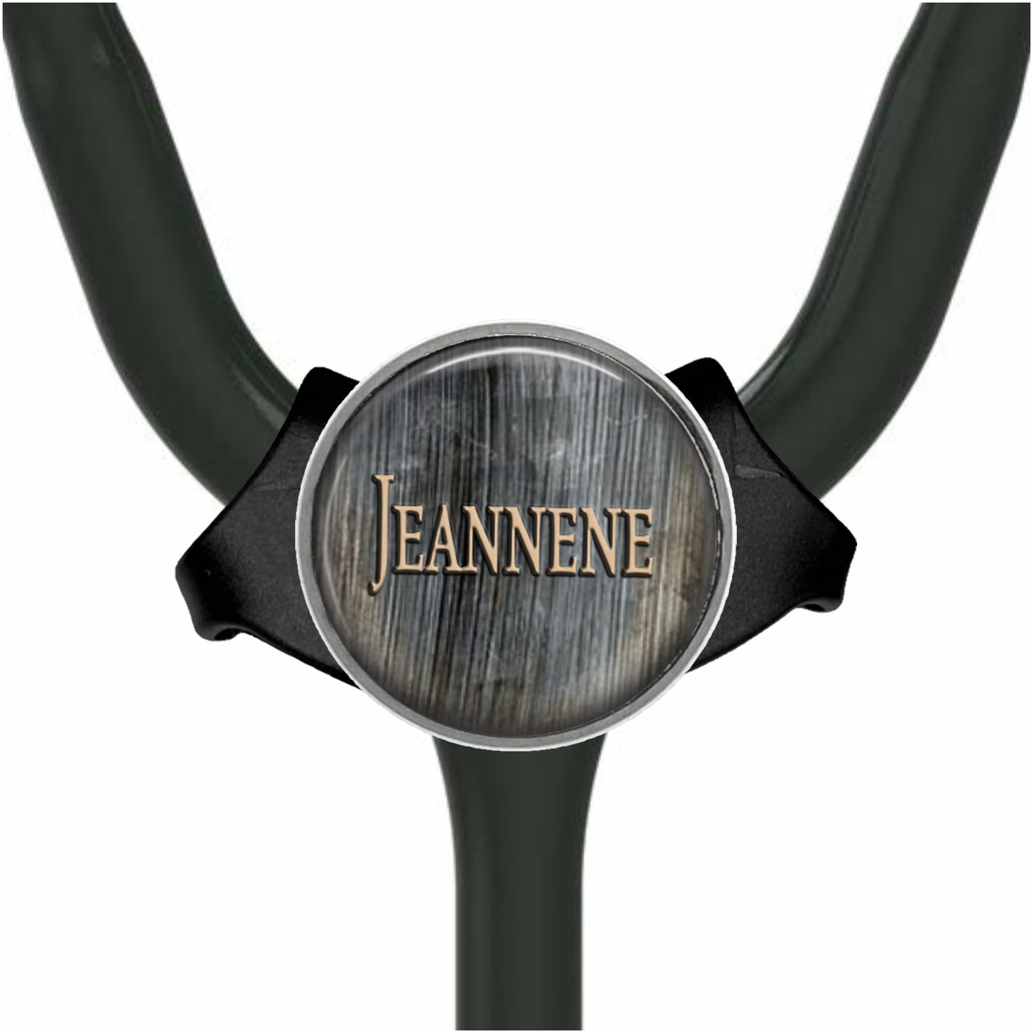 A stethoscope with a wooden-textured label that says "Jeanne".