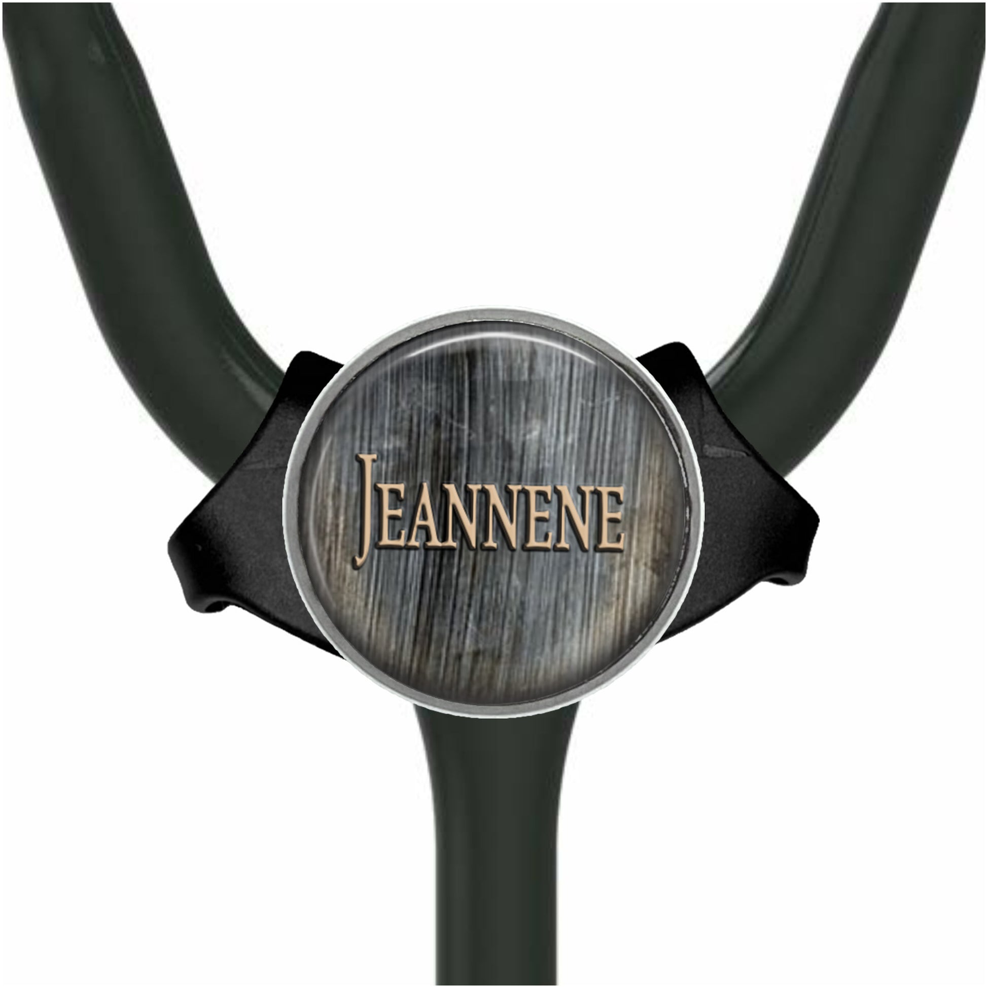 A stethoscope with a wooden-textured label that says "Jeanne".