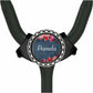 A black stethoscope with a round, floral-designed name badge on the handle.