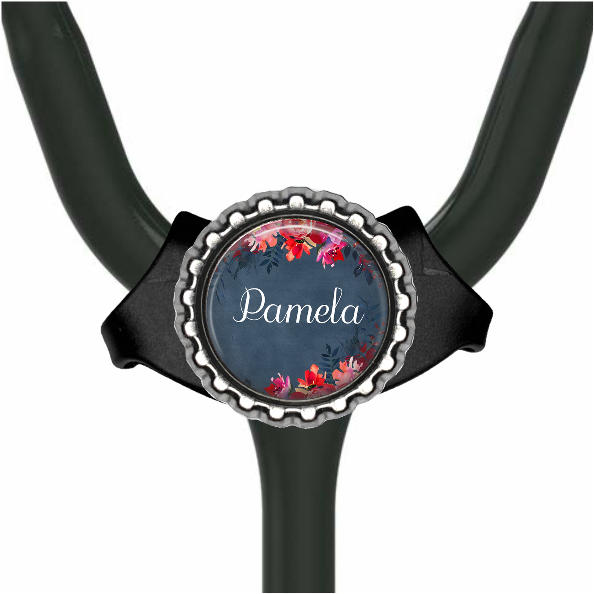A black stethoscope with a round, floral-designed name badge on the handle.