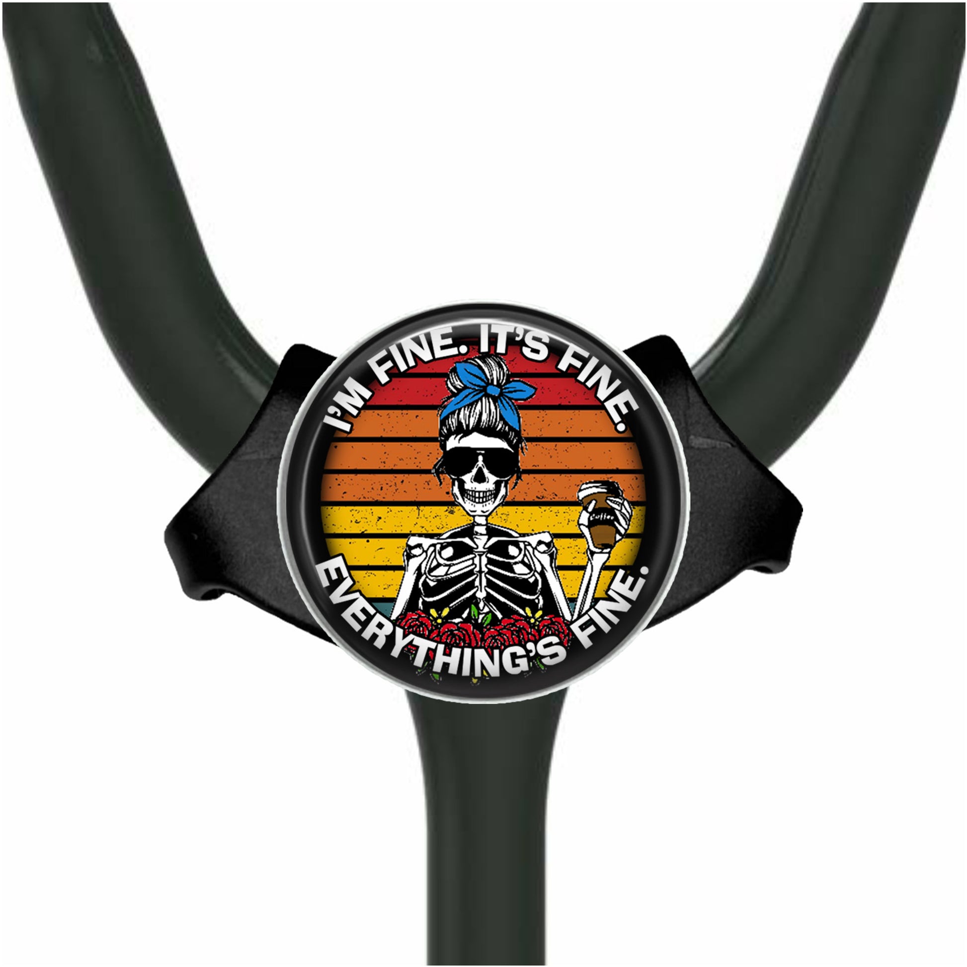 A black stethoscope with a circular badge featuring a skeleton wearing a blue headband and the text "I'm fine, it's fine, everything's fine."