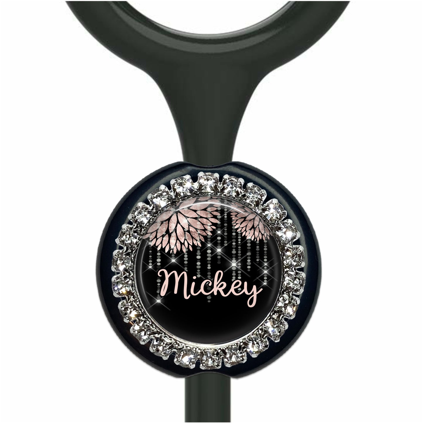 A black and silver medical device with a personalized nameplate.