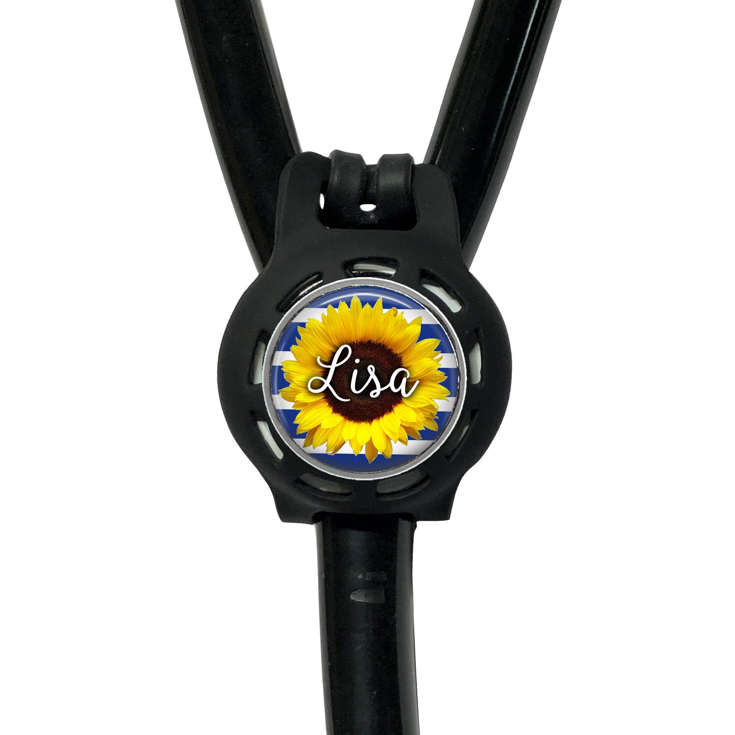 A black stethoscope with a personalized nameplate attached to it. The nameplate features a sunflower design and the name "Lisa".